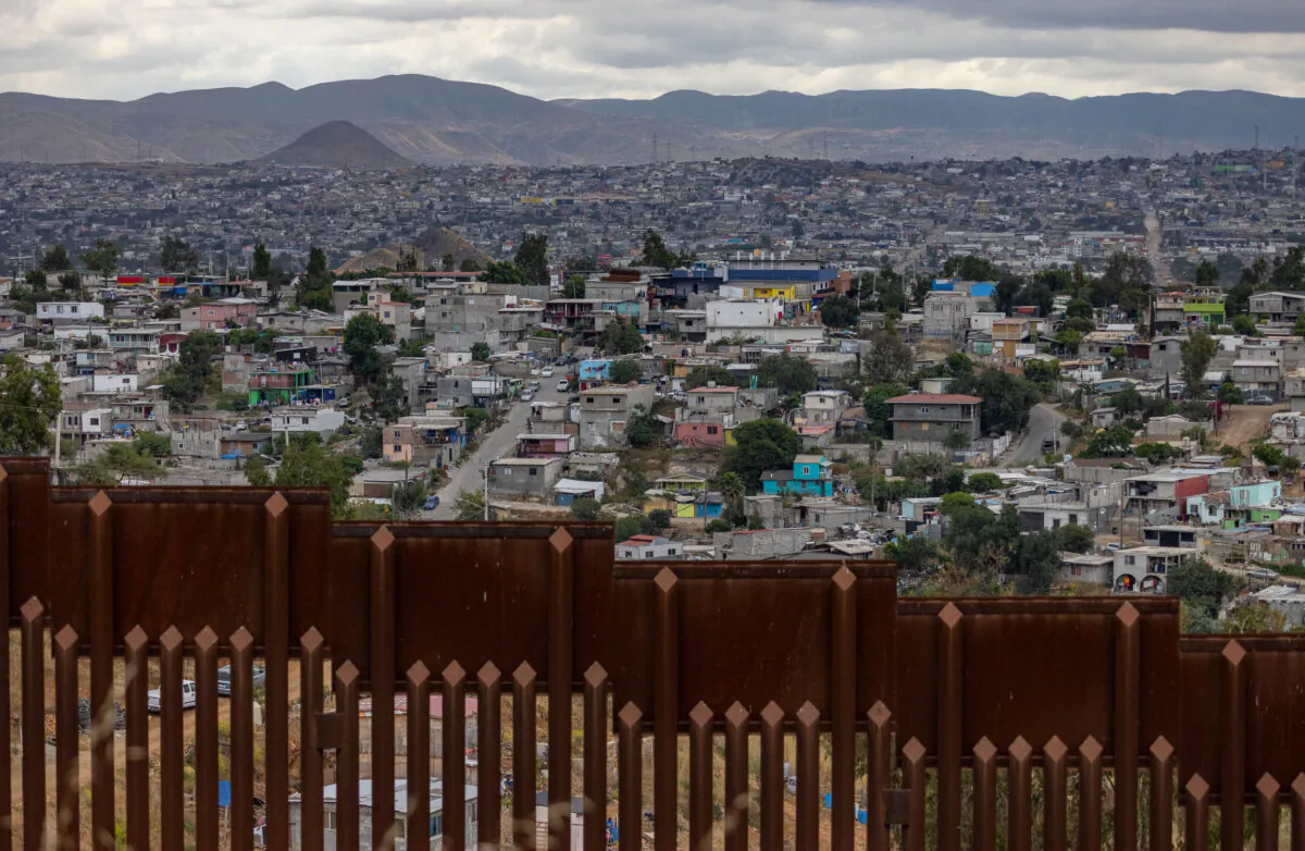 Tijuana, Mexico seen through the U.S. border wall near San Diego, Calif., on May 31, 2023. (John Fredricks/The Epoch Times)