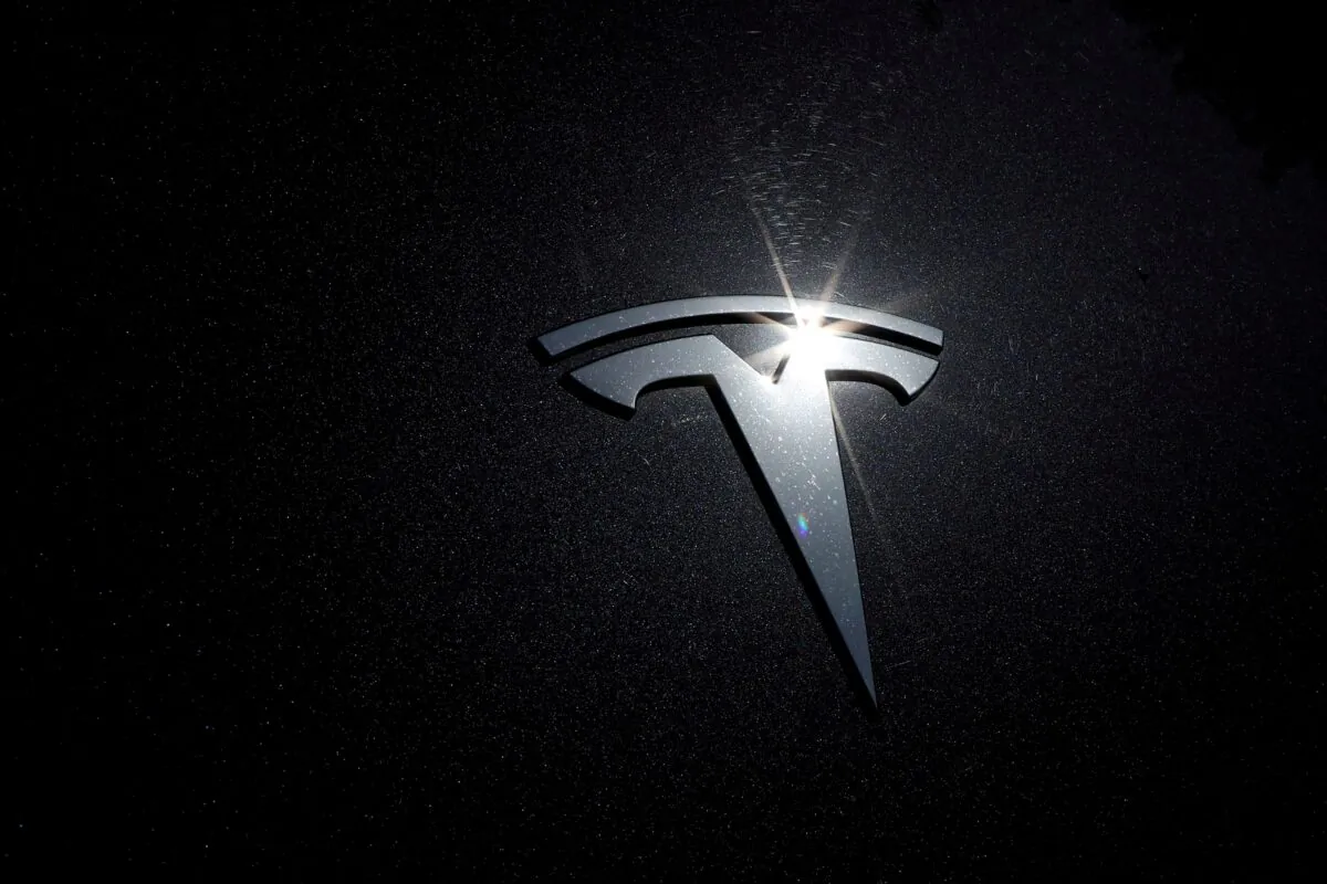 The Tesla logo on a car in Los Angeles on July 9, 2020. (Lucy Nicholson/Reuters)