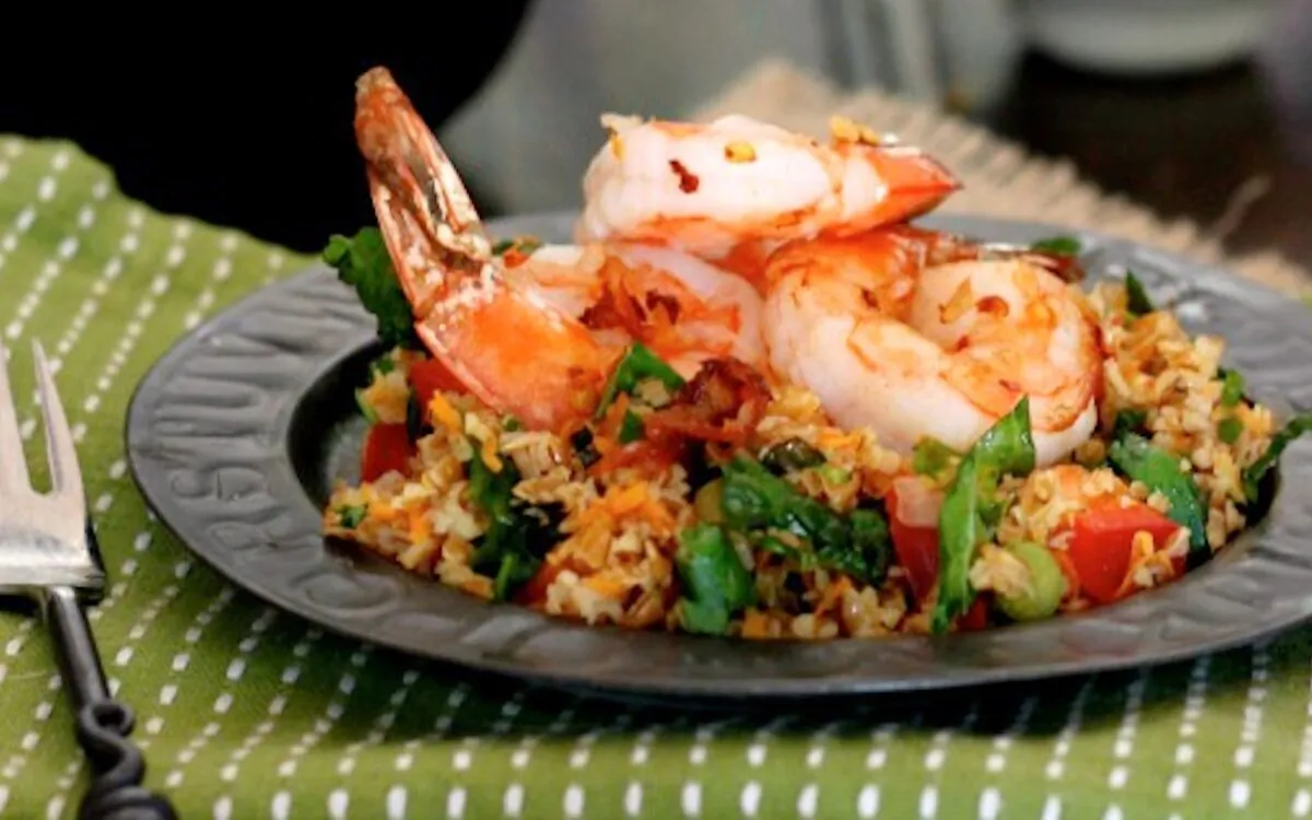 This bulgur salad is tumbled with lemon, spices, and fresh herbs, along with chopped peppers and grated carrot for juicy sweetness and crunch. (Lynda Balslev for Tastefood)