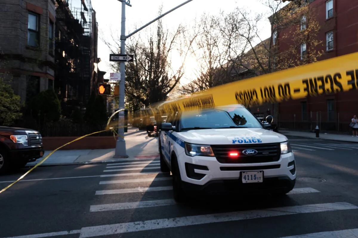 New York City police gather at the scene of a shooting of a 78-year-old man by police in the Bedford-Stuyvesant neighborhood of the Brooklyn borough of New York on April 13, 2023. (Spencer Platt/Getty Images)