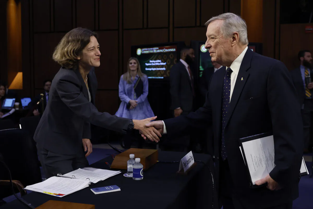 Senate Judiciary Committee Chairman Richard Durbin (D-Ill.) greets University of Virginia School of Law Professor Amanda Frost (L) before she testifies before the committee in the Hart Senate Office Building on Capitol Hill on May 2, 2023. (Chip Somodevilla/Getty Images)