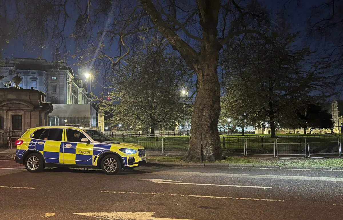 A police car outside Buckingham Palace in London on May 2, 2023. (Ben Roberts-Haslam/PA via AP)