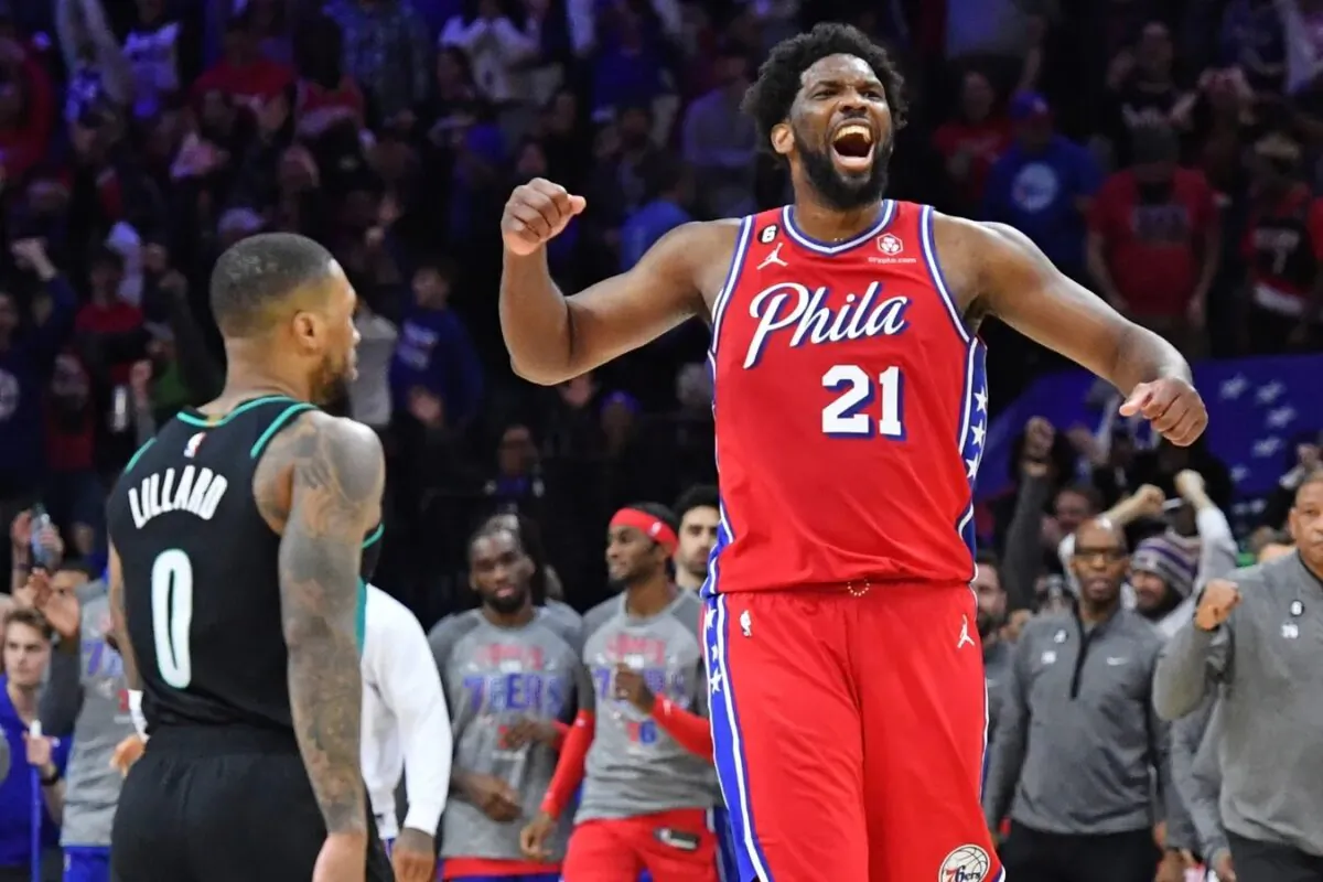 Philadelphia 76ers center Joel Embiid (21) celebrates win over Portland Trail Blazers guard Damian Lillard (0) at Wells Fargo Center in Philadelphia on March 10, 2023. (Eric Hartline/USA TODAY Sports via Field Level Media)