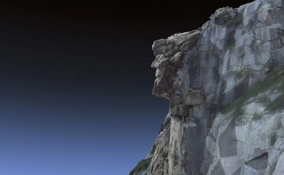 An interactive 3D model of the state's Old Man of the Mountain is shown back on Cannon Cliff in Franconia Notch on April 28, 2023. (Matthew Maclay via AP)