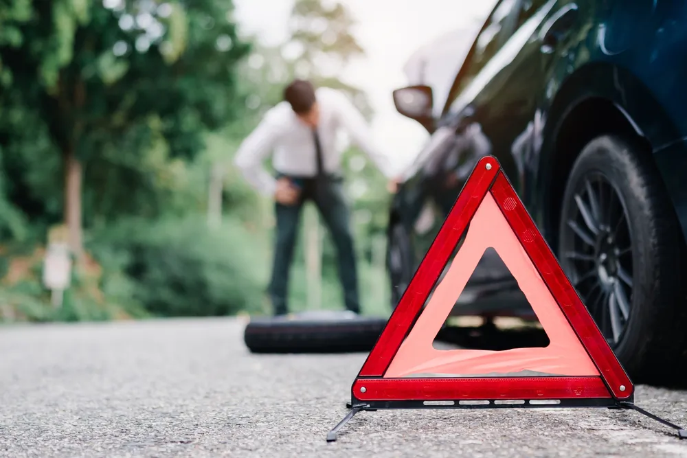 Modern cars are more reliable than ever, but drivers need to know how to get home safely in case nature throws them a curve ball. (MMD Creative/Shutterstock)