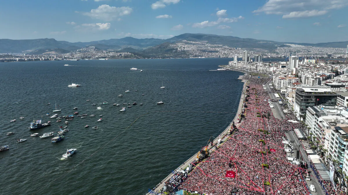 In this aerial photo, thousands of supporters wave flags and chant slogans while waiting for the arrival of eader of the Republican People's Party (CHP), Kemal Kilicdaroglu, and the presidential candidate of the Main Opposition alliance during a campaign rally in Izmir, Turkey, on April 30, 2023. CHP leader Kemal Kilicdaroglu is holding campaign rallies across Turkey ahead of the countries May 14, 2023 presidential and parliamentary elections. The Kilicdaroglu-led Nation Alliance is representing six opposition parties in next month's election against President Recep Tayyip Erdogan's 20-year rule. (Burak Kara/Getty Images)