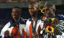 Calvin Davis, Olympic Medalist in 400 Hurdles, Dies at 51