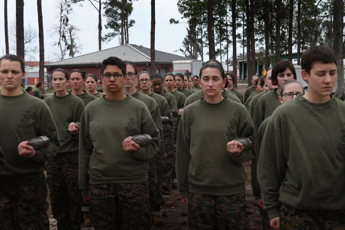 Female Marine recruits stand in formation during pugil stick training in boot camp at MCRD Parris Island, S.C., on Feb. 27, 2013. (Scott Olson/Getty Images)
