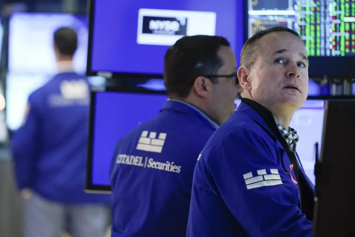 Traders work on the floor at the New York Stock Exchange in New York on May 3, 2023. (Seth Wenig/AP Photo)