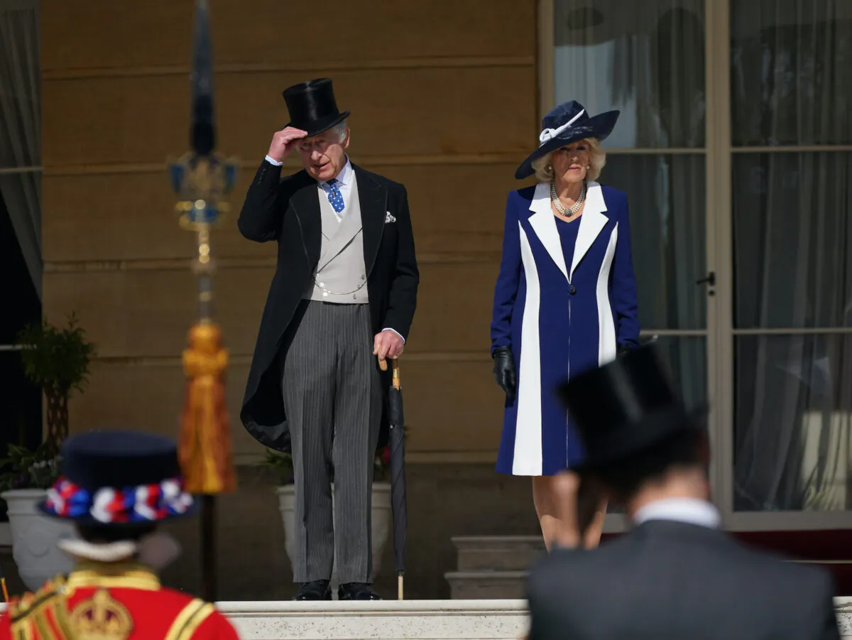 King Charles III and Camilla, Queen Consort during the Garden Party at Buckingham Palace ahead of the coronation of the King Charles III and the Queen Consort at Buckingham Palace in London, England on May 3, 2023. (Yui Mok/WPA Pool/Getty Images)