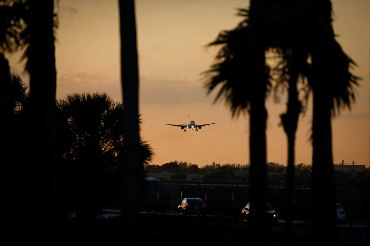 An aircraft approaches to land at Miami International Airport in Miami, Florida, on Jan. 2, 2023.  (Marco Bello/Reuters)