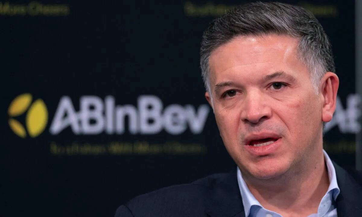 AB InBev CEO Michel Doukeris gives a press conference after a shareholders' meeting of the Anheuser-Busch InBev brewery group, in Brussels, on April 27, 2022. (Benoit Doppagne/BELGA/AFP via Getty Images)