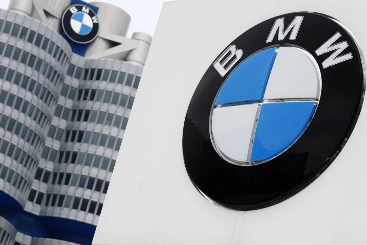 The logo of the German car manufacturer BMW is displayed on the headquarters in Munich on March 21, 2018. (Matthias Schrader/AP Photo)