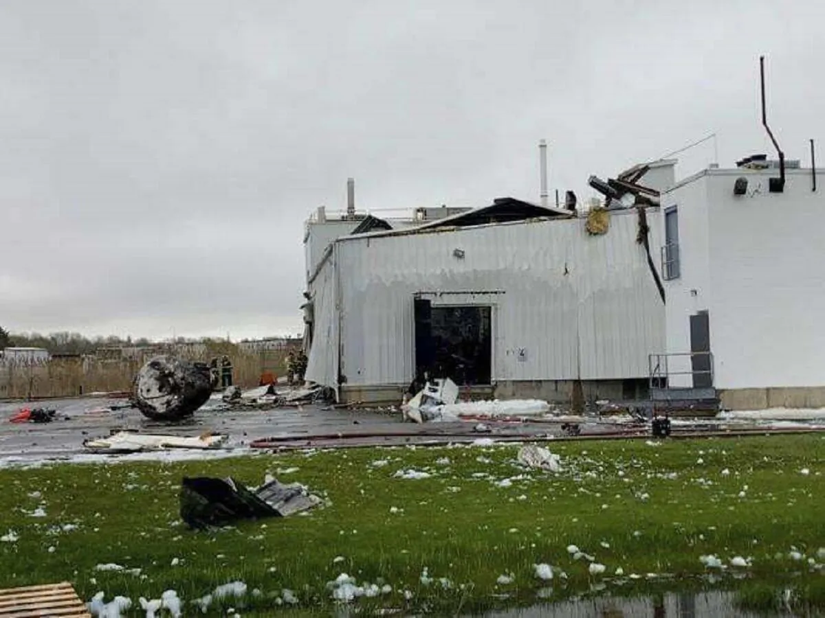 A vat that was once inside a Newburyport, Mass., pharmaceutical plant was hurled into the parking lot by an explosion on May 4, 2023. (Keith Sullivan/The Newburyport Daily News via AP)
