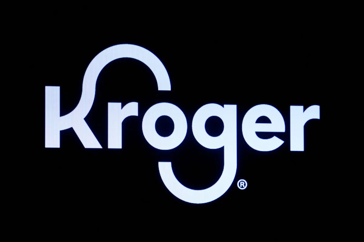 A screen displays the company logo for Kroger Co. on the floor of the New York Stock Exchange (NYSE) in New York on Oct. 14, 2022. (Brendan McDermid/Reuters)