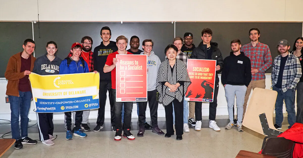 Activist Xi Van Fleet (Front, middle) with attendees at the TPUSA seminar, "Xi Van Fleet: Survivor of Communist China," at the University of Delaware, on May 1, 2023.  (Lily Sun/ The Epoch Times) 