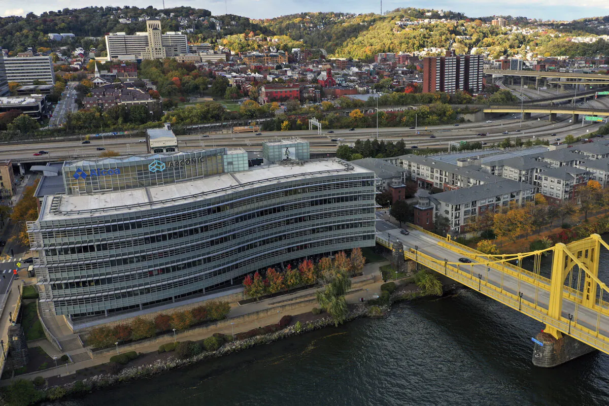 The Alcoa and Arconic headquarters (L) sit on the Northside of Pittsburgh on Oct. 17, 2022 along the Allegheny River. (Gene J. Puskar/AP Photo)