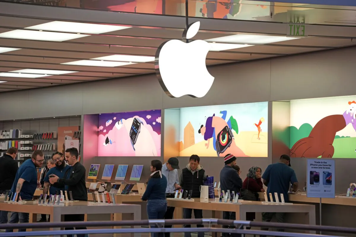 Customers shop in an Apple store in Pittsburgh on Jan. 30, 2023. (Gene J. Puskar/AP Photo)