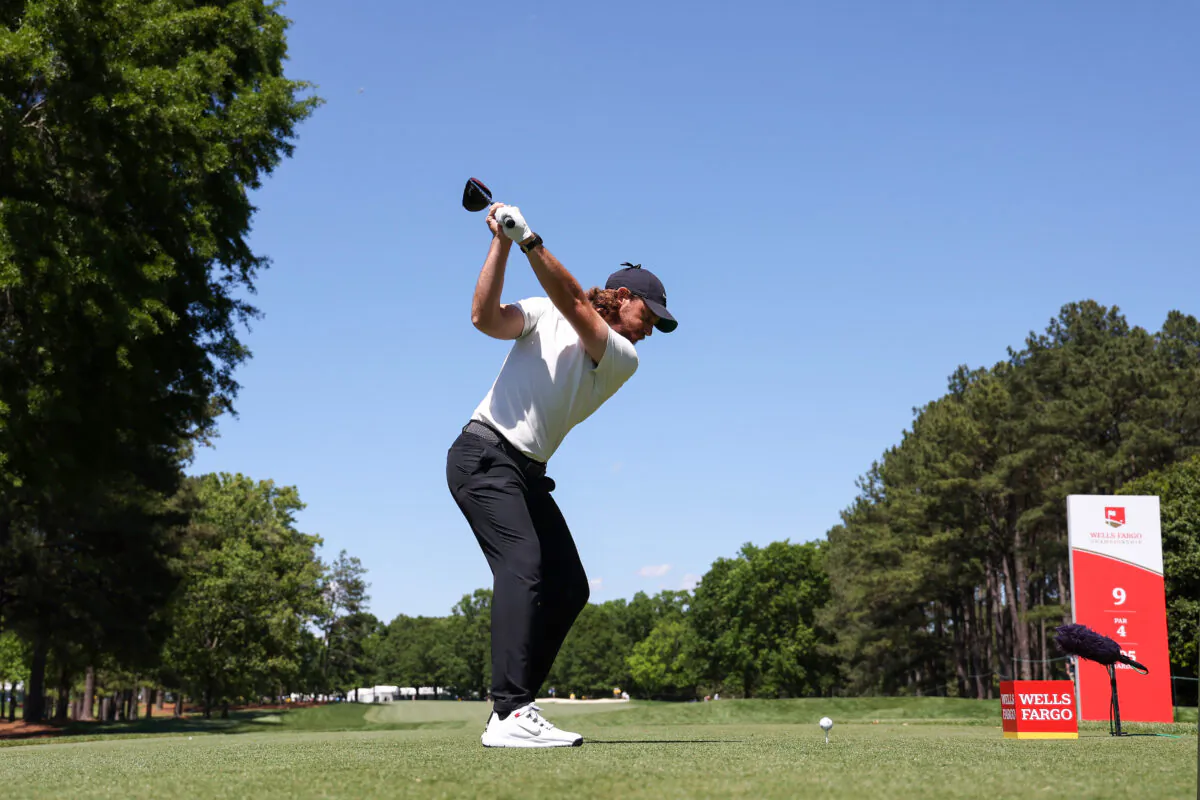 Tommy Fleetwood of England plays his shot from the ninth tee during the first round of the Wells Fargo Championship at Quail Hollow Country Club in Charlotte, N. C., on May 4, 2023. (Gregory Shamus/Getty Images)