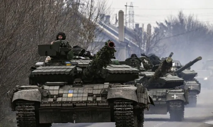 Ukrainian tanks move towards Bakhmut direction, in Donetsk Oblast region, on March 20, 2023. (Aris Messinis/AFP via Getty Images)