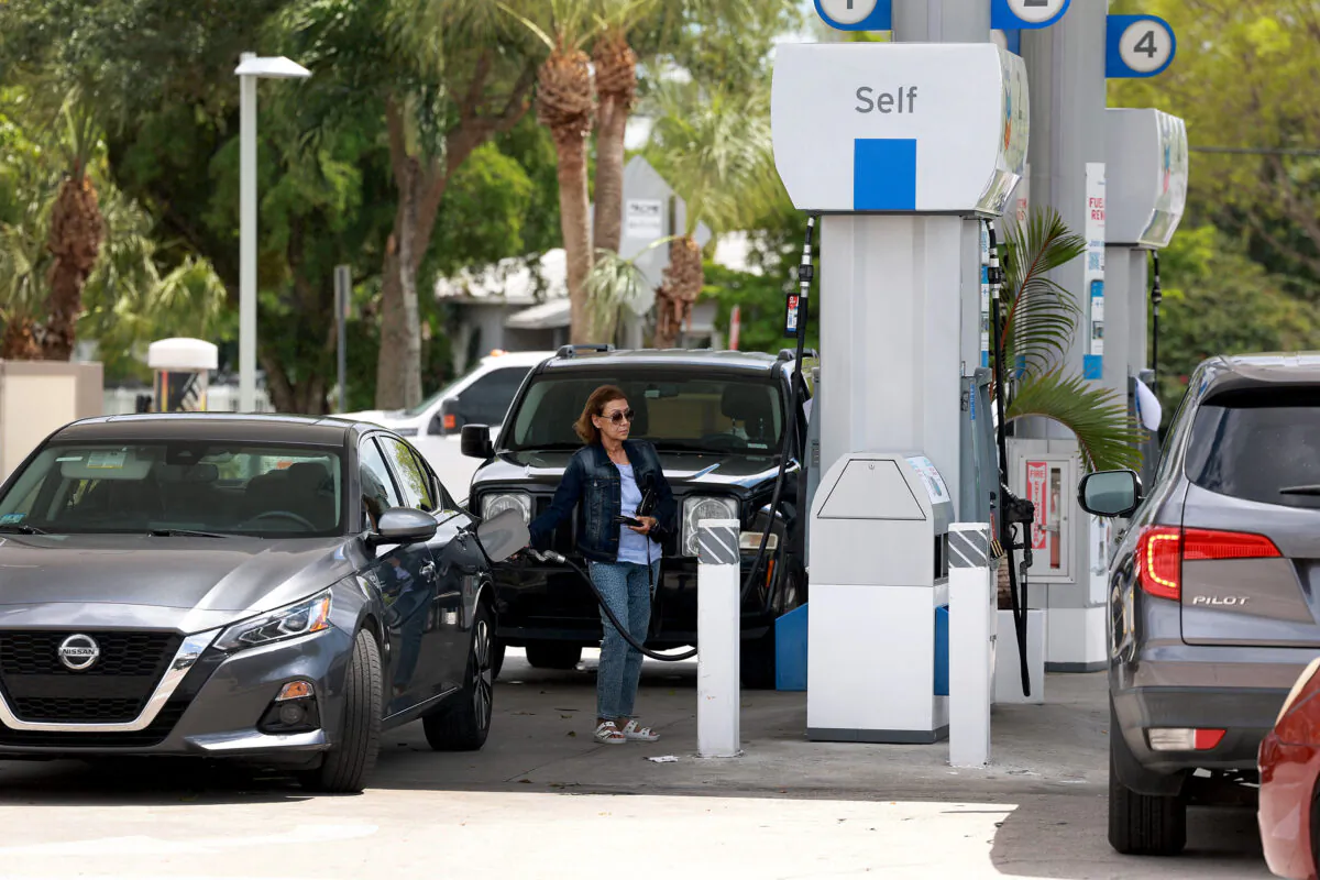 Vehicles line up to get fuel at a gas station in Miami, Florida, on April 17, 2023. (Joe Raedle/Getty Images)