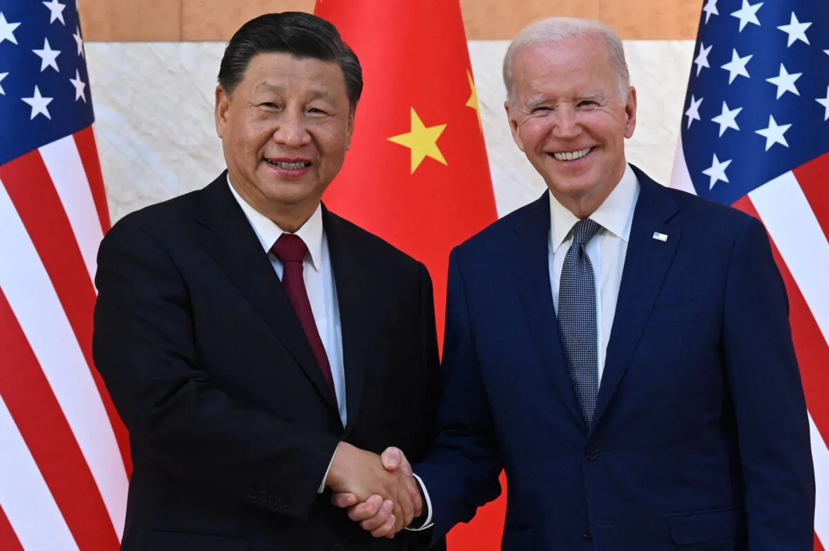 U.S. President Joe Biden and Chinese leader Xi Jinping meet on the sidelines of the G-20 Summit in Nusa Dua on the Indonesian resort island of Bali on Nov. 14, 2022. (Saul Loeb/AFP via Getty Images)