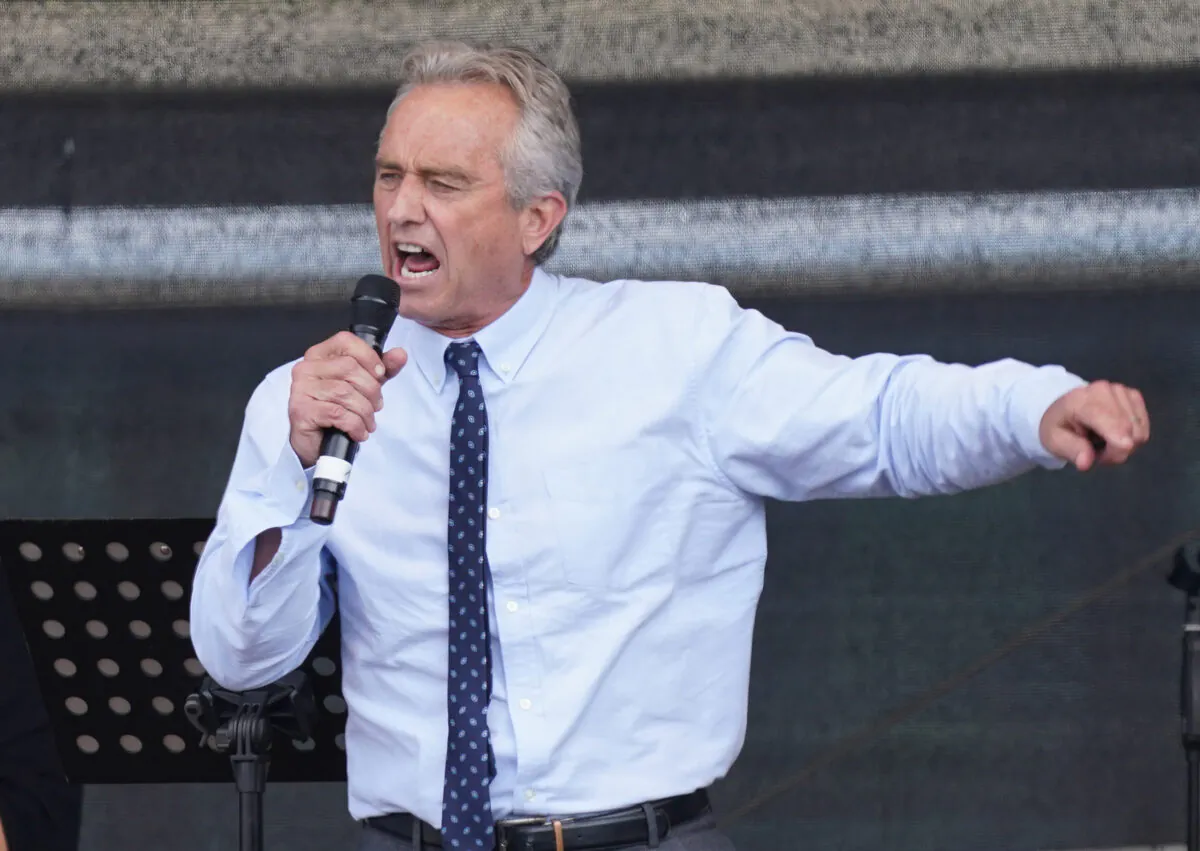 Robert F. Kennedy, Jr., nephew of former U.S. President John F. Kennedy, speaks to people gathered under the Victory Column in the city center to hear speeches during a protest against coronavirus-related restrictions and government policy, in Berlin, Germany, on Aug. 29, 2020. (Sean Gallup/Getty Images)