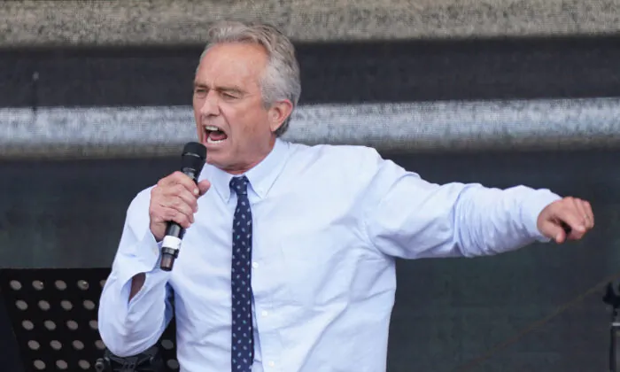 Robert F. Kennedy, Jr., nephew of former U.S. President John F. Kennedy, speaks to people gathered under the Victory Column in the city center to hear speeches during a protest against coronavirus-related restrictions and government policy, in Berlin, Germany, on Aug. 29, 2020. (Sean Gallup/Getty Images)