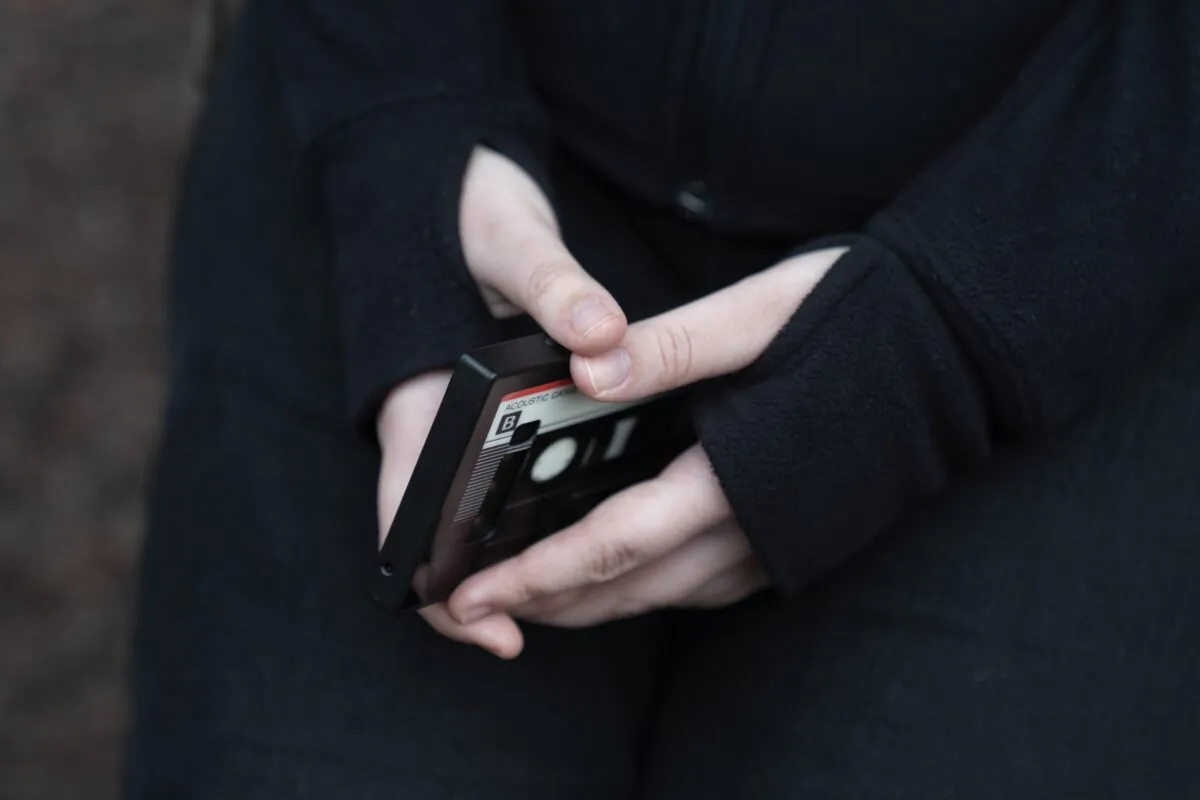 A file photo of a 16-year-old girl holding her phone. (AP Photo Erin Hooley)