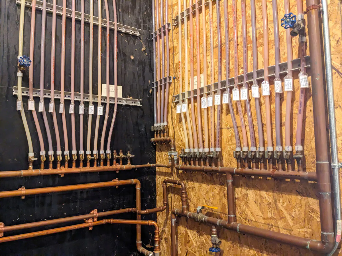 These are the hot and cold PEX water lines in my own home. I know it appears complex, like spaghetti thrown on a wall, but it’s not. DIY plumbing has never been easier. (Tim Carter/Tribune Content Agency)