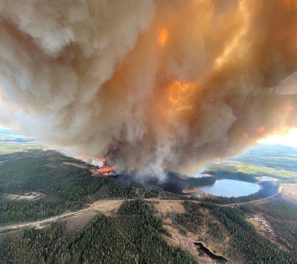 NextImg:More Than 13,000 People Forced From Homes as Wildfires Burn Across Alberta