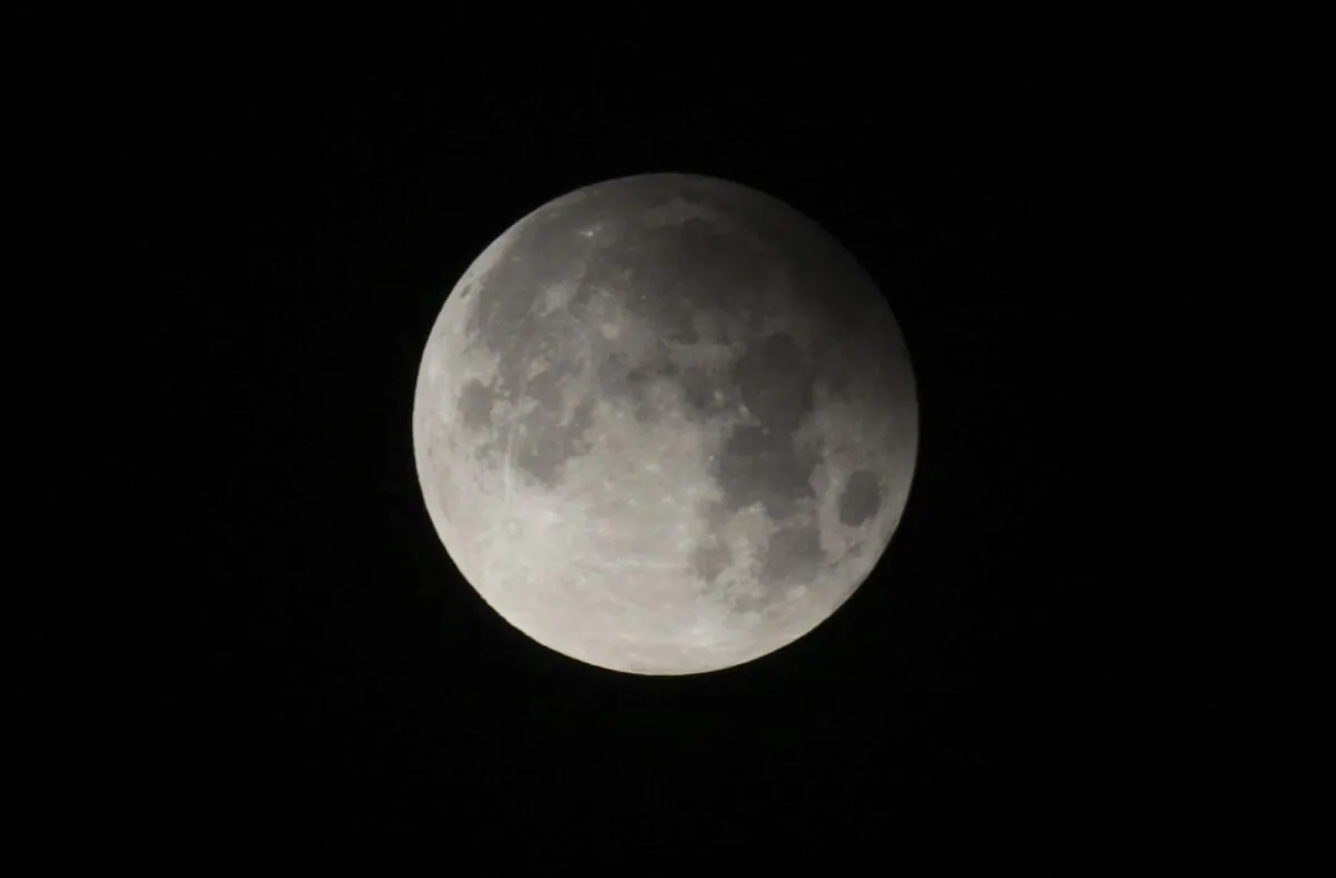 A penumbral lunar eclipse is seen from Lahore, Pakistan, on Feb. 11, 2017. (K.M. Chaudhry/AP Photo)