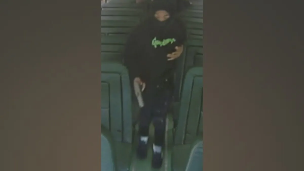 A person with a gun in Oxon Hill, Md., on May 1, 2023. (Prince George's County Police Department via AP)