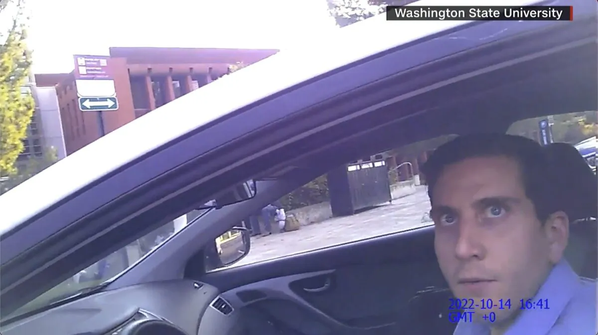 An officer from Washington State University stops Bryan Kohberger for a traffic violation on Oct. 14, 2022, in a still from video. (Courtesy of Washington State University)