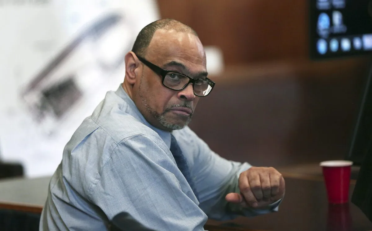 Shaun Harrison reacts as attorneys give closing arguments in his trial in Suffolk Superior Court in Boston on May 30, 2018. (Pat Greenhouse/The Boston Globe via AP)