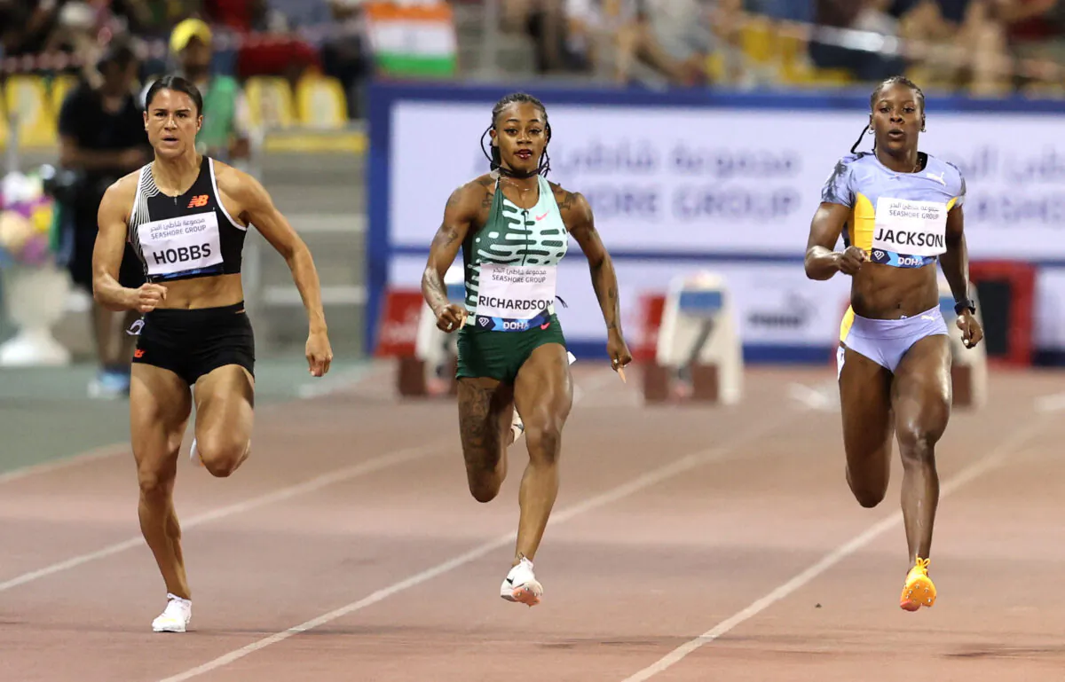 New Zealand's Zoe Hobbs, Sha'Carri Richardson of the United States, and Jamaica's Shericka Jackson in action at the women's 100m during the Diamond League at the Suheim bin Hamad Stadium in Doha, Qatar, on May 5, 2023. (Ibraheem Al Omari/Reuters)