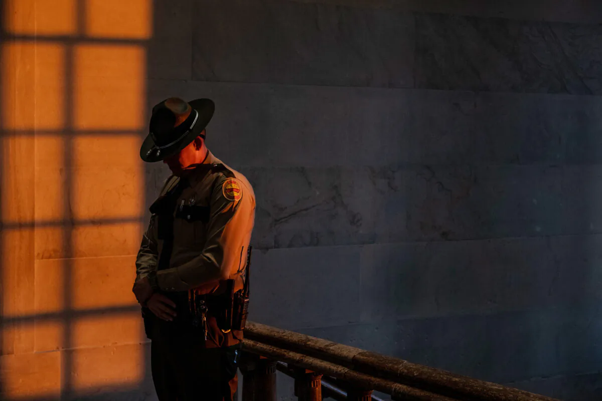 A Tennessee state trooper stands watch inside the Capitol building during a House session on April 10, 2023 in Nashville, Tennessee. (Seth Herald/Getty Images)