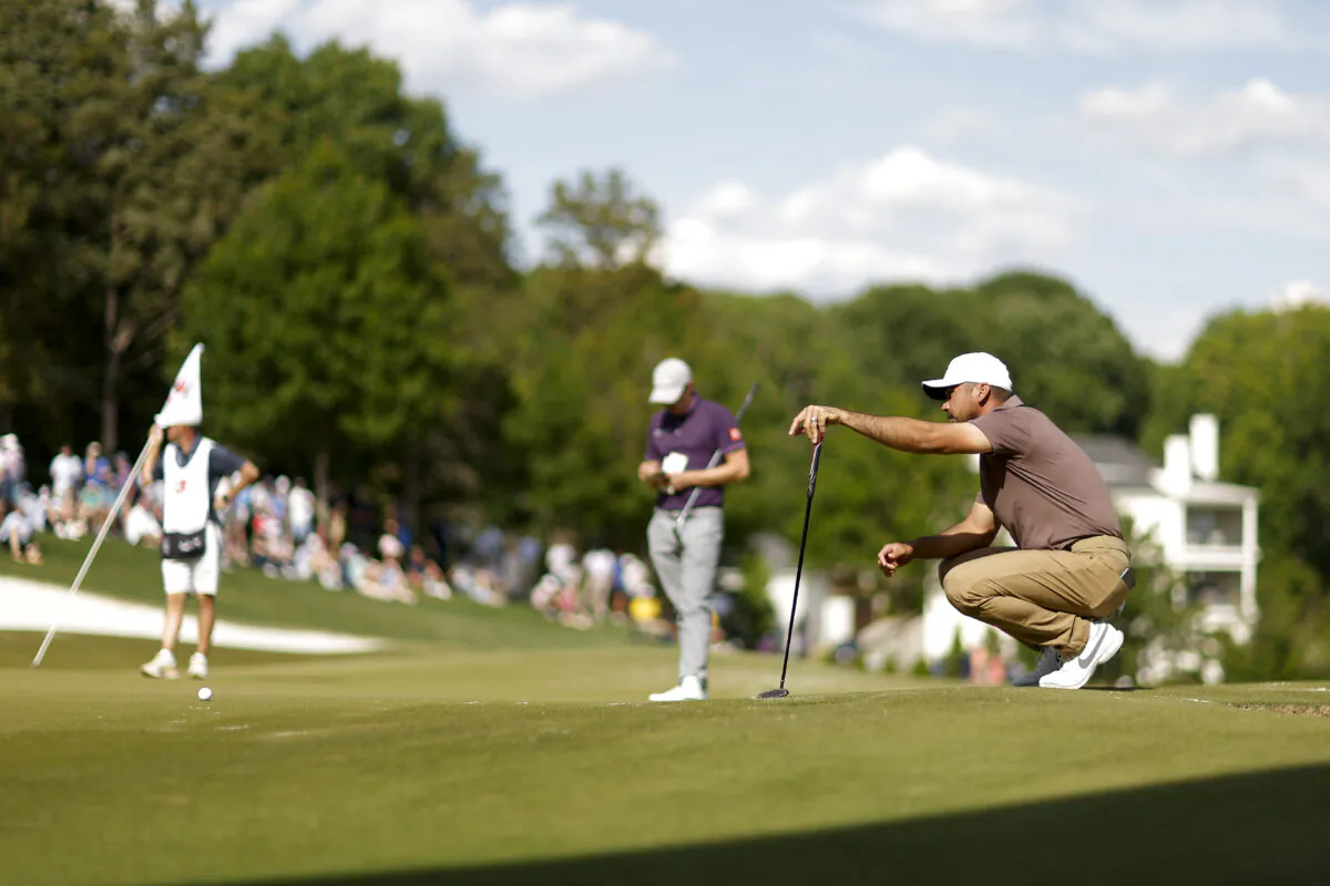 Jason Day of Australia lines up a putt on the 15th green during the second round of the Wells Fargo Championship at Quail Hollow Country Club in Charlotte, N.C., on May 5, 2023. (Mike Ehrmann/Getty Images)