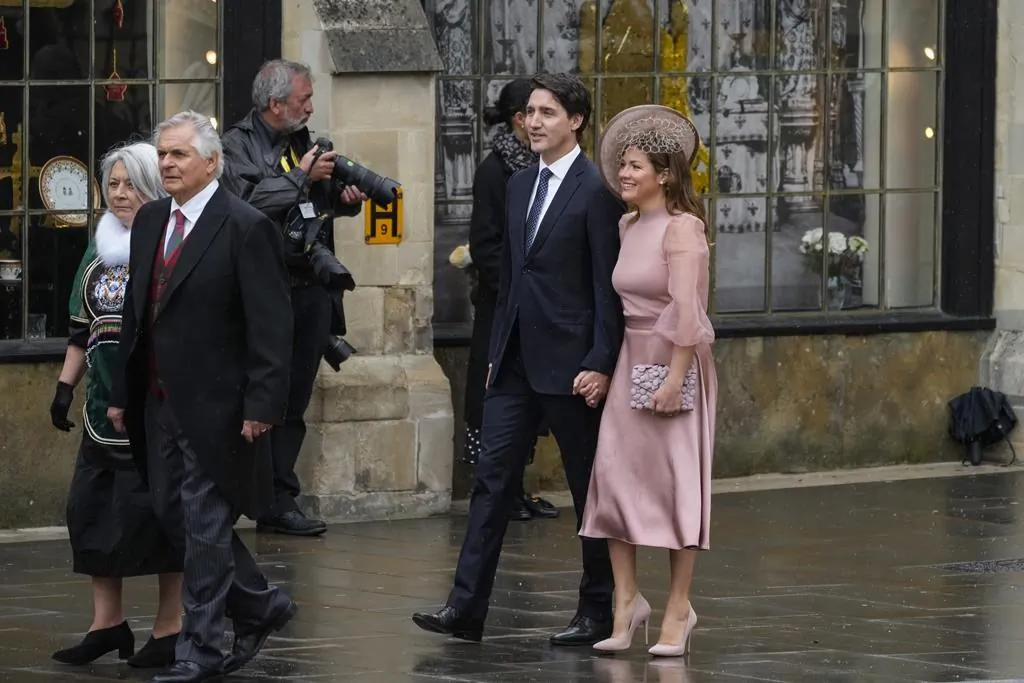 Canadian Prime Minister Justin Trudeau and Sophie Trudeau arrive at Westminster Abbey prior to the coronation ceremony of Britain's King Charles III in London on May 6, 2023. (AP Photo/Alessandra Tarantino)