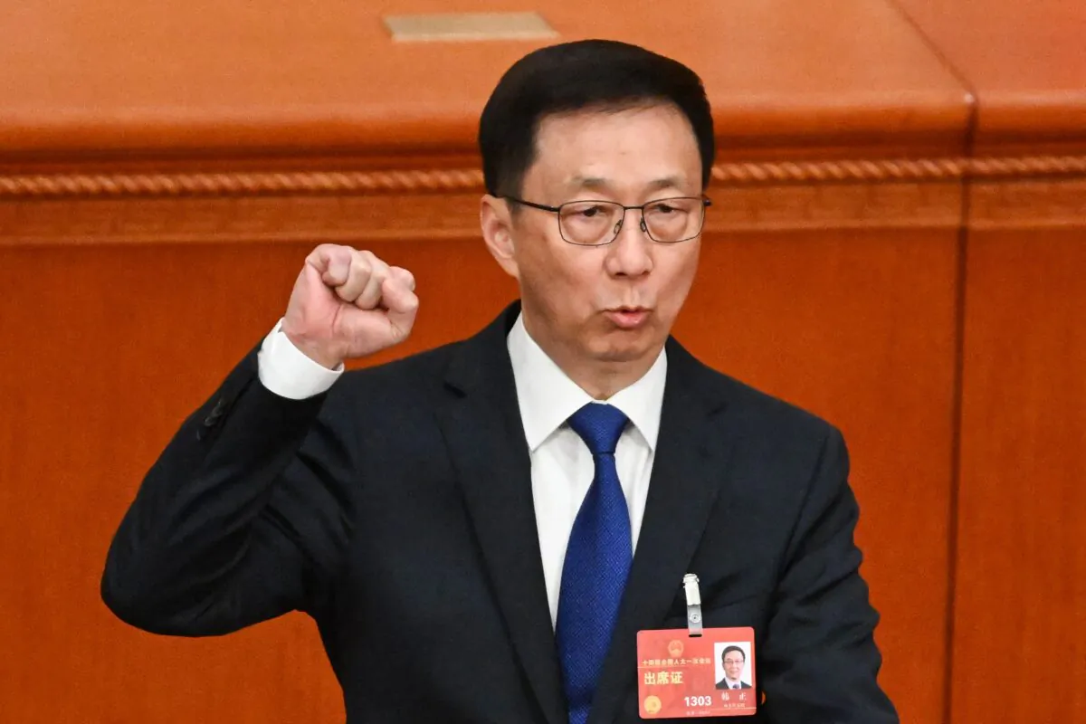 Han Zheng takes an oath after being named China's vice-president during the third plenary session of the National People's Congress (NPC) at the Great Hall of the People, in Beijing, on March 10, 2023. (Noel Celis/AFP via Getty Images)