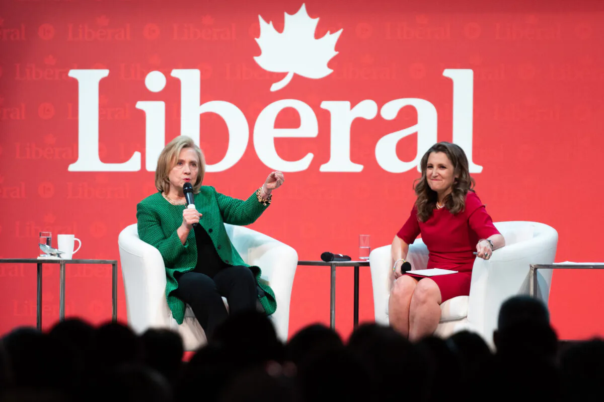 Former U.S. Secretary of State Hillary Clinton (L) and Deputy Prime Minister and Minister of Finance Chrystia Freeland take part in a keynote address during the second day of the Liberal Convention in Ottawa, on May 5, 2023. (Spencer Colby/The Canadian Press)