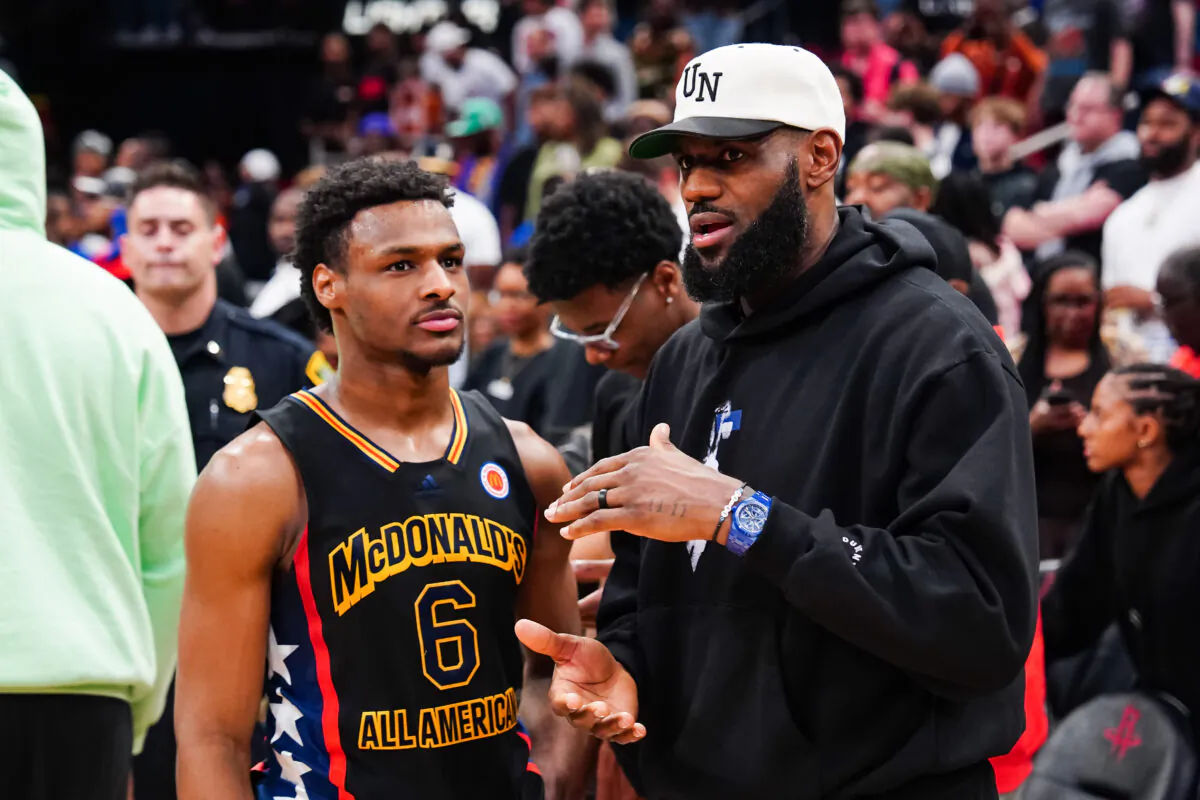 Bronny James #6 of the West team talks to Lebron James of the Los Angeles Lakers after the 2023 McDonald's High School Boys All-American Game at Toyota Center in Houston, Texas, on March 28, 2023. (Alex Bierens de Haan/Getty Images)