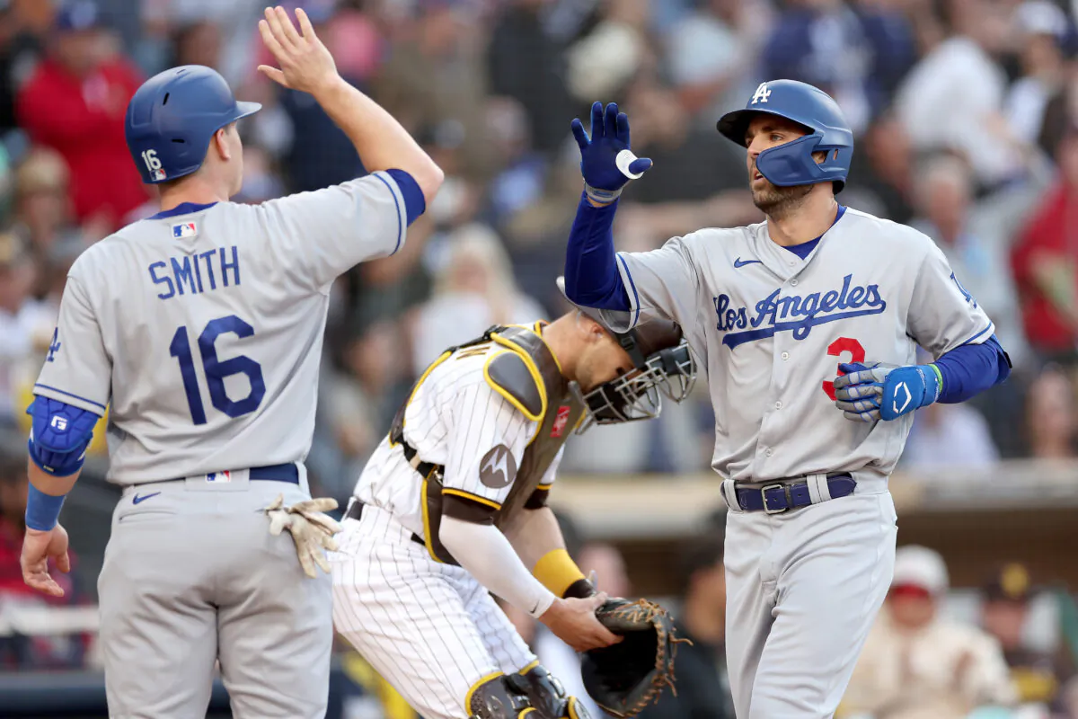 Will Smith (16) congratulates Chris Taylor (3) of the Los Angeles Dodgers after his two-run homerun during the fourth inning of a game against the San Diego Padres at PETCO Park in San Diego on May 6, 2023. (Sean M. Haffey/Getty Images)