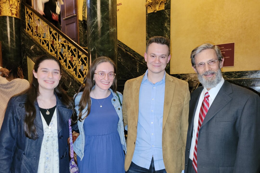 Philip Blosser (R) enjoyed Shen Yun's evening performance at the Detroit Opera House on May 6, 2023. (Charlie Lu/The Epoch Times)