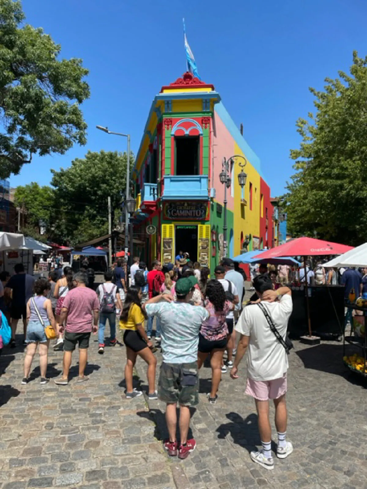 Colorful buildings and cobblestone streets are the hallmark of La Boca in Buenos Aires, Argentina. (Photo courtesy of Lesley Frederikson.) 