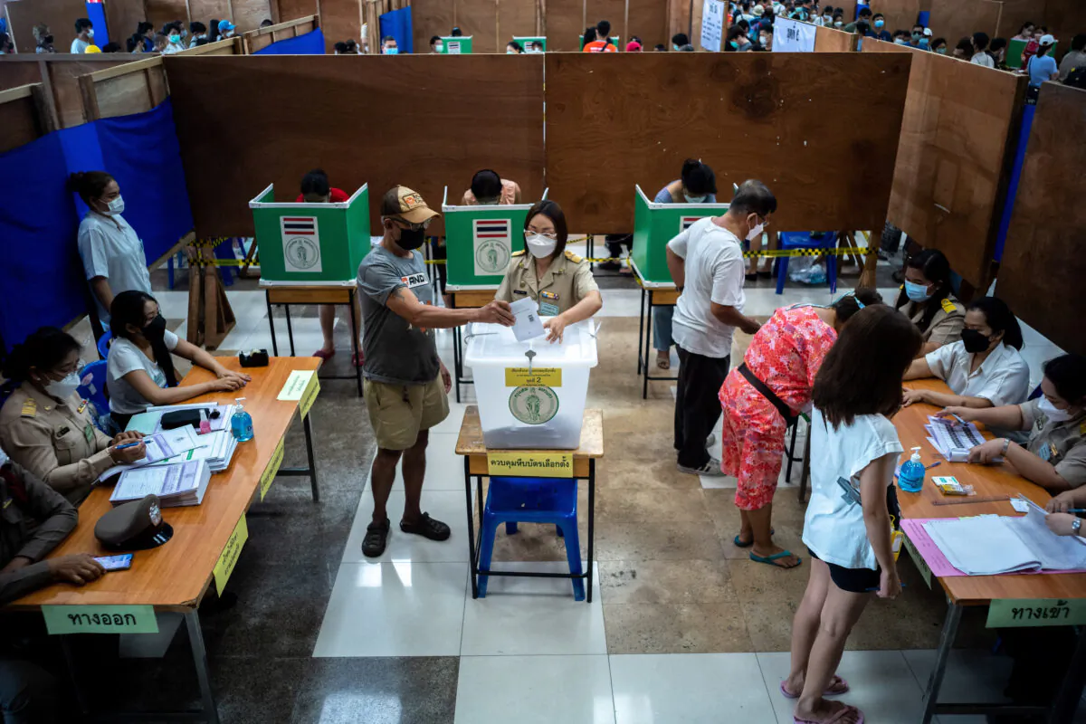 People cast their early vote for the upcoming Thailand's general election at a polling station in Bangkok, Thailand, on May 7, 2023. (Athit Perawongmetha/Reuters)