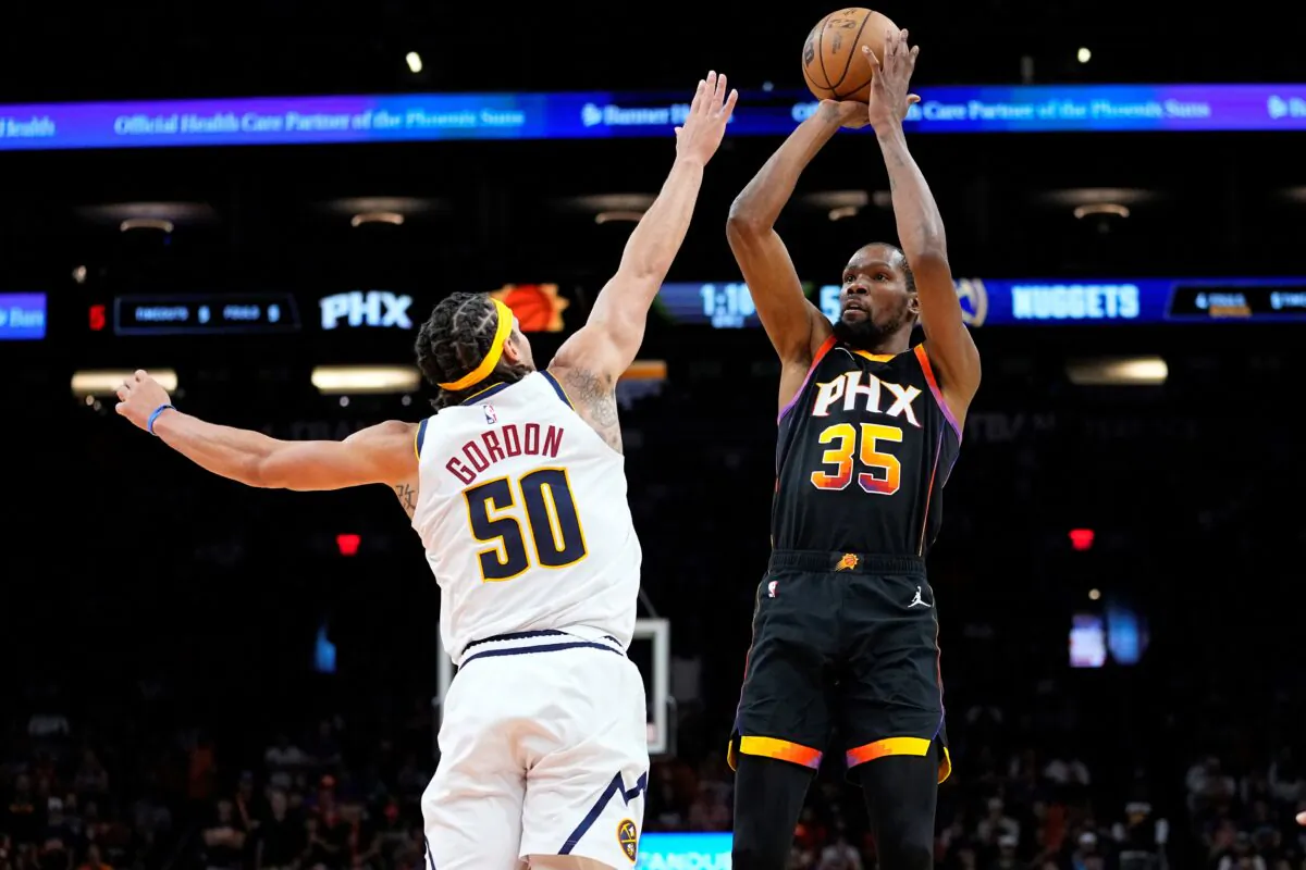 Phoenix Suns forward Kevin Durant (35) shoots over Denver Nuggets forward Aaron Gordon (50) during the first half of Game 4 of an NBA basketball Western Conference semifinal game in Phoenix on May 7, 2023. (Matt York/AP Photo)
