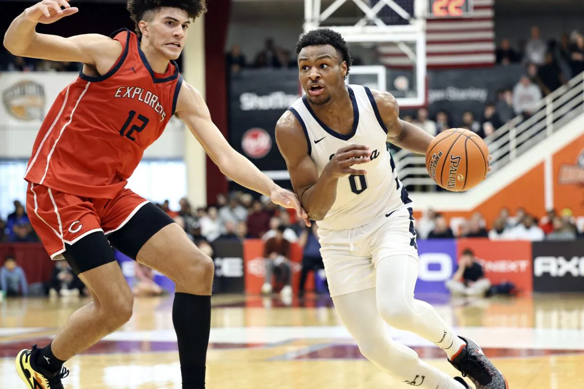 Sierra Canyon's Bronny James (0) drives against Christopher Columbus during a high school basketball game at the Hoophall Classic in Springfield, Mass., on Jan. 16, 2023. (Gregory Payan/AP Photo)