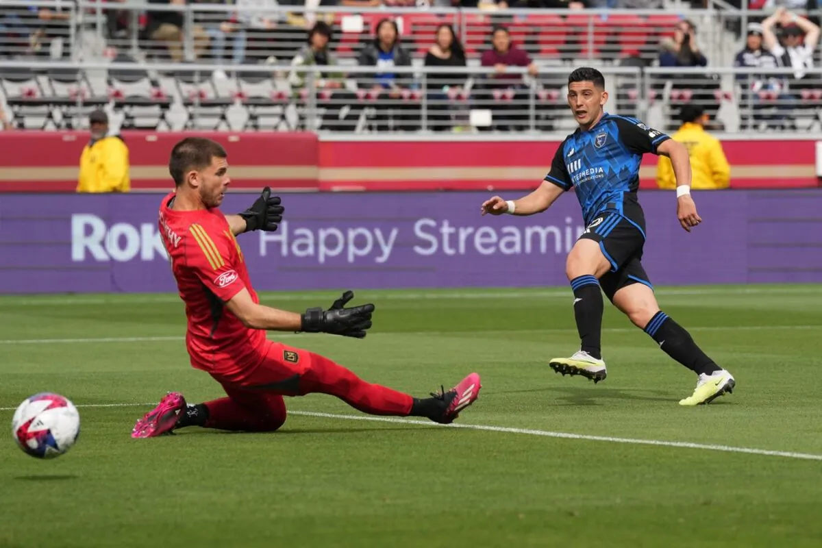 San Jose Earthquakes forward Cristian Espinoza (10) scores a goal against Los Angeles FC goalkeeper John McCarthy (77)  during the first half at Levi's Stadium in Santa Clara, Calif., on May 6, 2023. (Darren Yamashita/USA TODAY Sports via Field Level Media)