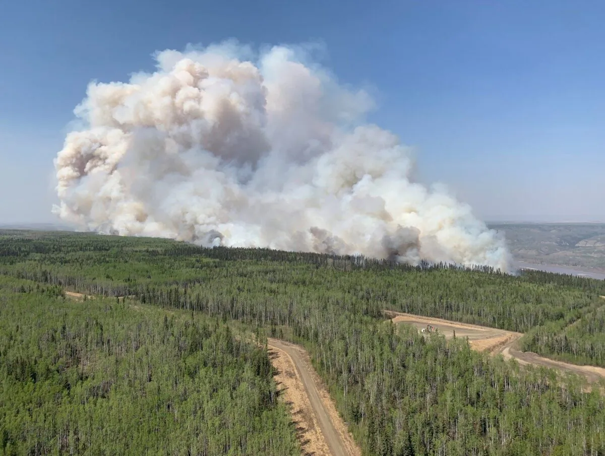 Wildfire GWF018 burns a section of forest in the Grande Prairie district of Alberta in a May 6, 2023, handout photo. 
(The Canadian Press/HO-Government of Alberta Fire Service)
